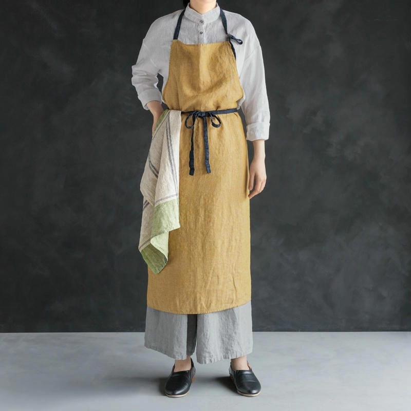 Tạp dề là phụ kiện không thể thiếu khi nấu ăn